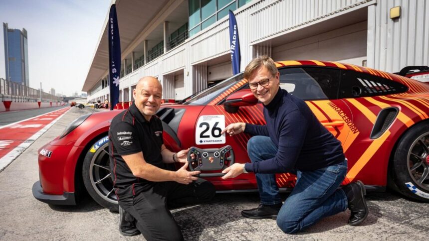 Porsche Carrera Cup Middle East race car on Gulf circuit featuring STARTRADER branding during the 2025/2026 racing season.